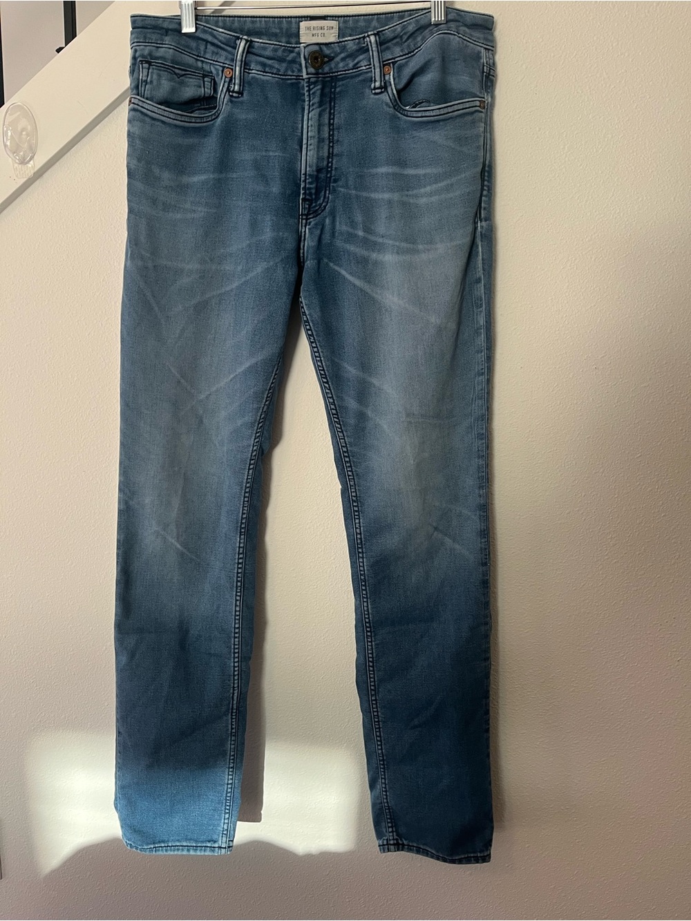 The Rising Sun Sustainable Slim Jeans in Light Blue Wash